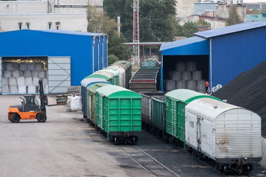 shipping-containers-transporting-coal-by-train-and-2023-11-27-05-35-24-utc-min